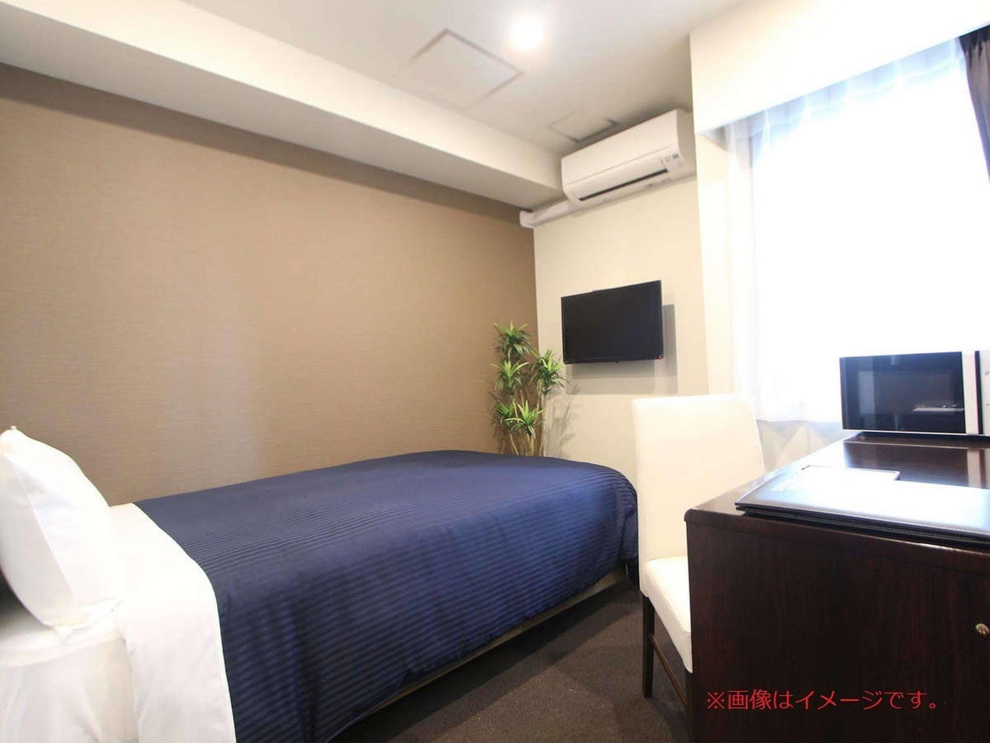 Hotel Livemax Umeda Doyama Осака Экстерьер фото
